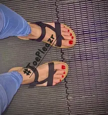 Showing off ny pretty RubyRed toes in my new sandles.. What do ya’ll think ??